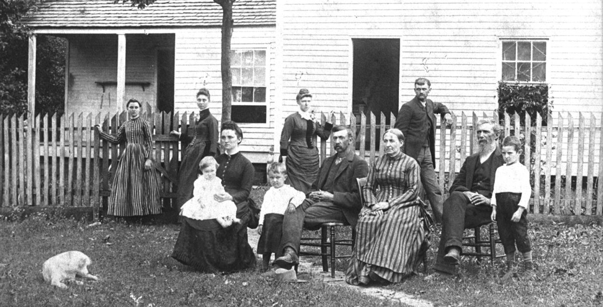  George McNeely Family - Picture taken about 1889.  Back row L to R: Gusta Cunningham, Rutha McNeely Lang, Dovey McNeely Snider, John T. McNeely.  Front row L to R: child - Lewis Morton, Mollie McNeely Morton, child - Ruel Morton, Mary Mitchell McNeely, George W. McNeely, Henry McLard.  