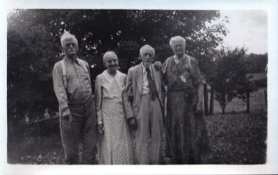  L to R: John T. McNeely and his wife Jennie Stevenson McNeely, Jennie's brother Alpheus and his wife Julia Stevenson.  Photo taken 1937 - Jennie's 75th birthday. 