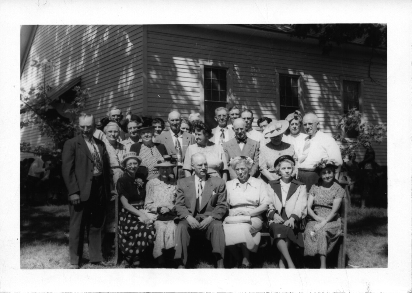 Apple Creek Day May 20, 1951.  Stevenson family.  
Front row L to R:  Onis McNeely Poe, Willi Shoults Sides, Lang Stevenson, Lois McNeely Regenhardt, Lucille Stevenson, ?.
First row standing: Ed Tuschoff, Elsie McNeely Tuschoff, ?, Maple Stevenson, ?, ?, ?, Hugh Roy Stevenson
Second row standing, Ted Regenhardt......
That is all that I can identify.