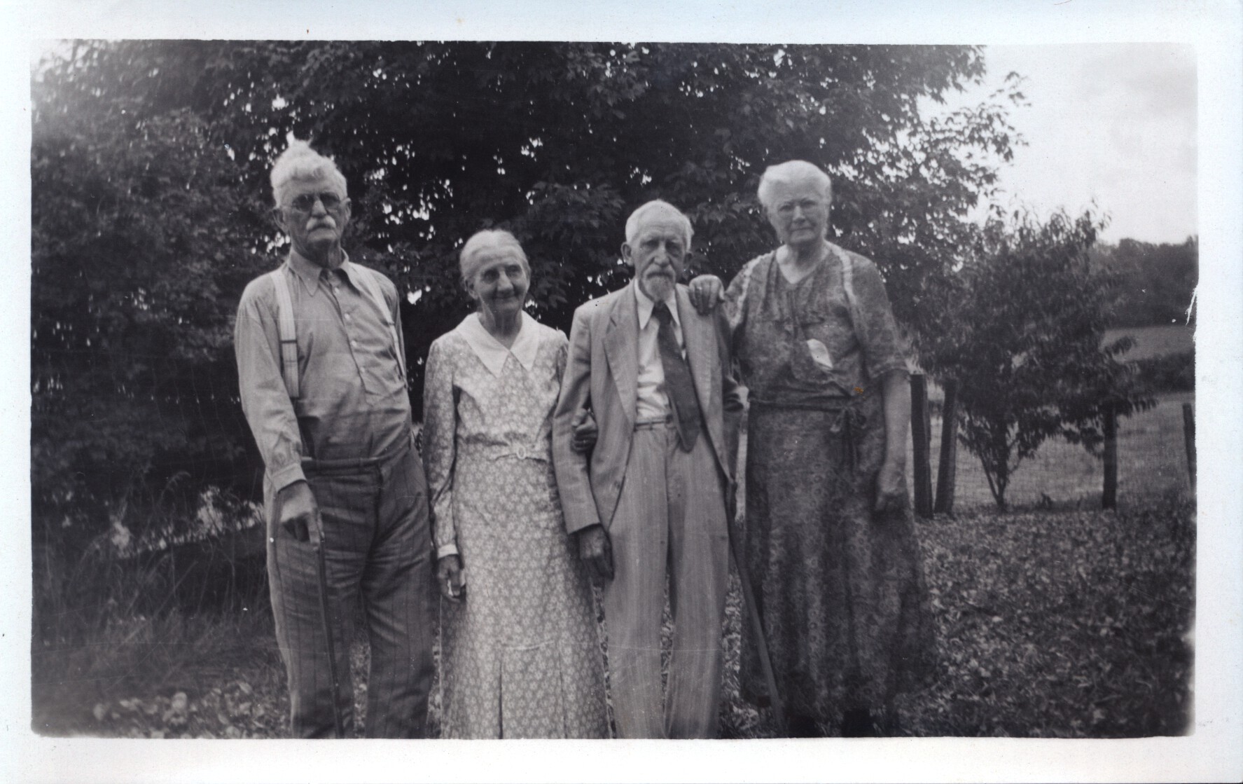 L to R: John T. McNeely and his wife Jennie Stevenson McNeely, Jennie's brother Alpheus and his wife Julia Stevenson.  Photo taken 1937 - Jennie's 75th birthday.