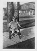 Alice Regenhardt - age 2 - in chair on sidewalk