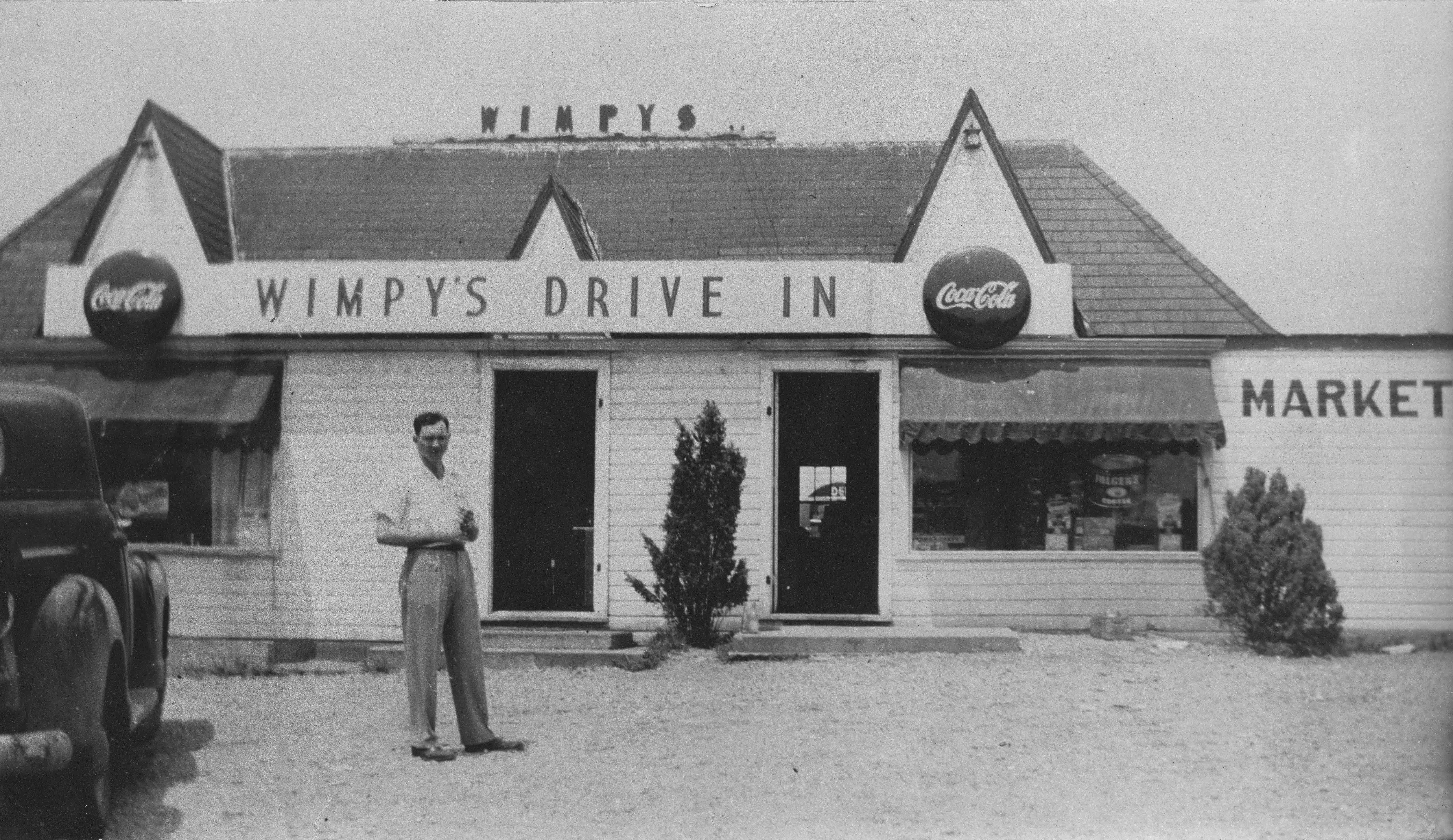  Freeman Lewis in front of the new Wimpy's about 1948 