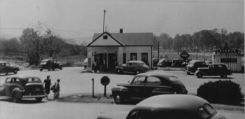  Original Wimpy's stand to right of filling station in front of Arena Park 