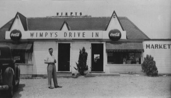 Freeman Lewis in front of the new Wimpy's about 1948 